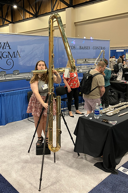 Katherine Beatty, Middle Tennessee State University student and music industry major, plays a double contra bass flute in the Phoenix Convention Center Exhibit Hall in Phoenix, Arizona, in August 2023. Beatty recently attended the prestigious National Flute Association Convention in Phoenix, along with seven other MTSU students. (Submitted photo)