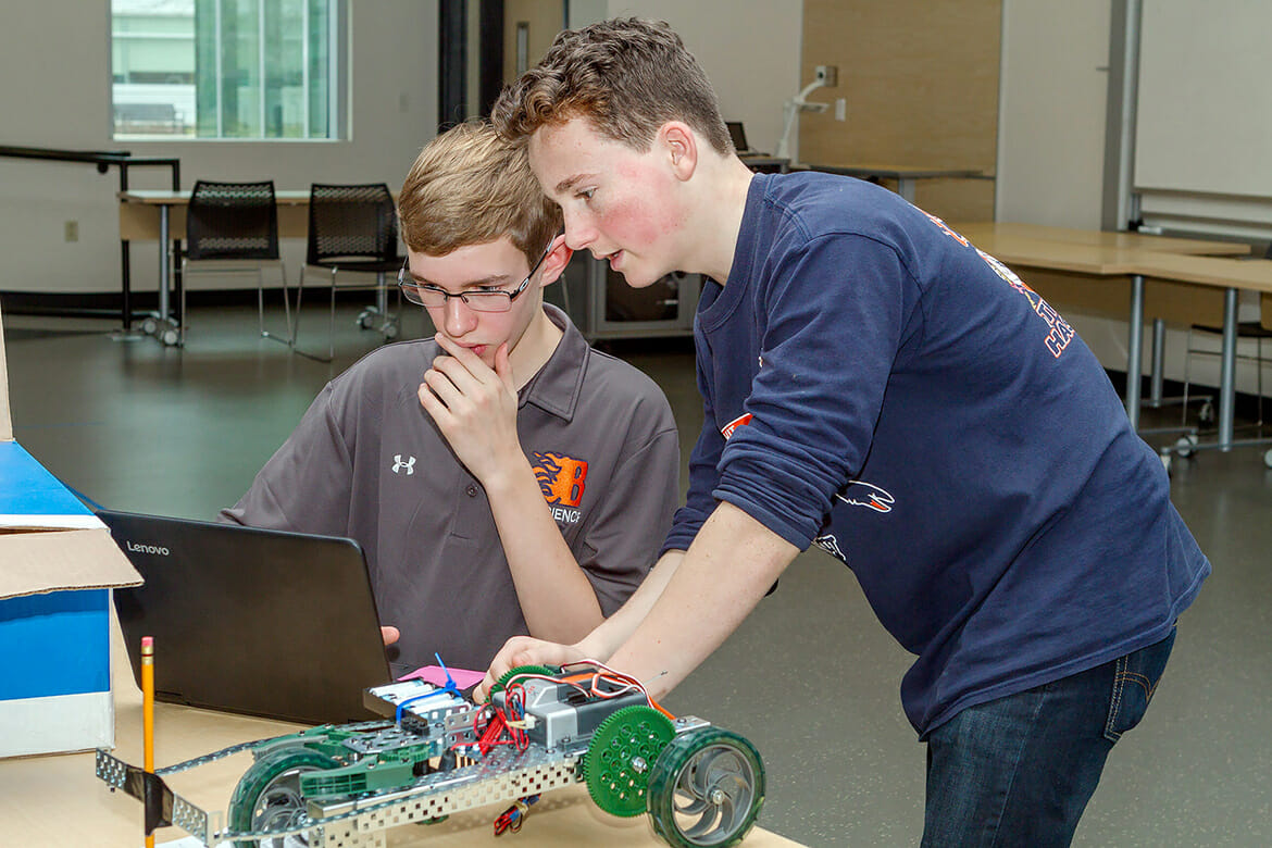 Blackman High School students Ian Goodman and Micah Wolfgram work on a “battery buggy” project at the 23rd Regional Science Olympiad held Feb. 24 at MTSU. A total of 28 high school and middle school teams received a hands-on experience into the world of science. (MTSU photo by J. Intintoli)
