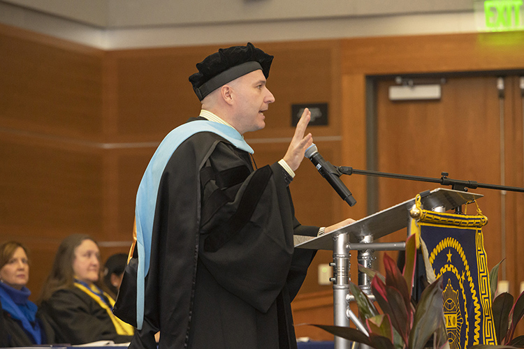 Dr. Jason Martin, interim dean of the James E. Walker Library, delivers the keynote address at the fall 2019 initiation ceremony of The Honor Society of Phi Kappa Phi Nov. 12 in the Student Union Ballroom. (MTSU photo by Cat Curtis Murphy)