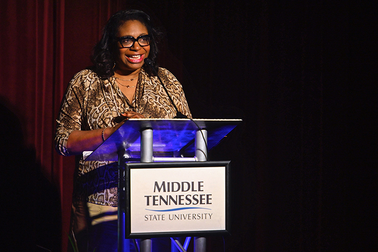 Jennifer Woodard, associate dean of the MTSU College of Media and Entertainment, accepts the 2021 John Pleas Award at a Feb. 24 livestreamed ceremony from Keathley University Center. (MTSU photo by Cat Curtis Murphy)