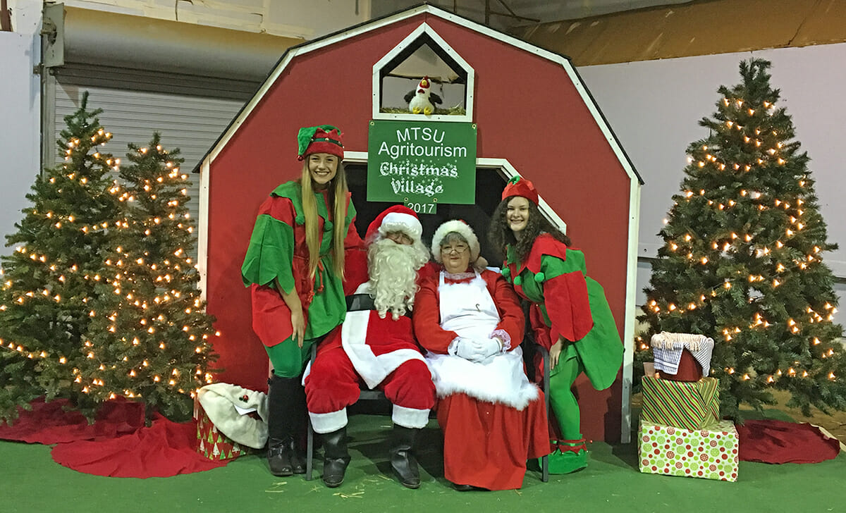 Santa, Mrs. Claus and elves