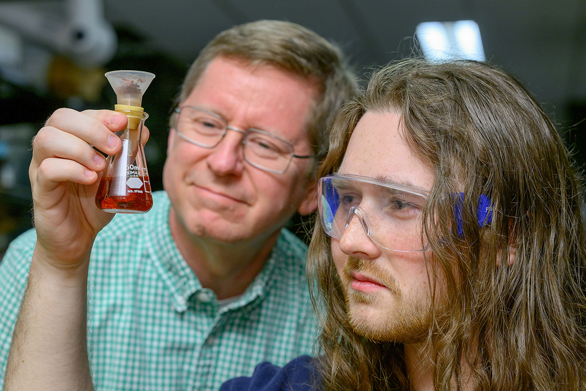 Middle Tennessee State University biochemistry major Isaac Puckett, of Whites Creek, Tenn., right, and chemistry professor Scott Handy, one of his research mentors, inspect a compound created in an MTSU Science Building lab on campus in Murfreesboro, Tenn., in this spring 2025 photo. Puckett has been named a 2025 recipient of the prestigious Barry Goldwater Scholarship, one of 441 students selected nationwide for the highly competitive award. (MTSU photo by J. Intintoli)