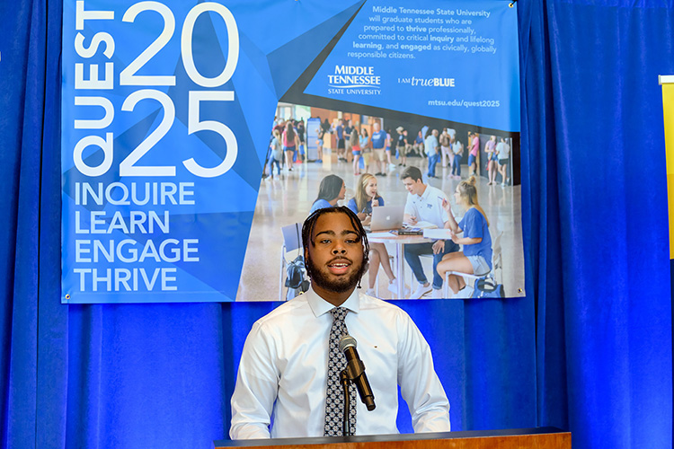MTSU student Will Rosser, a marketing major from Memphis, Tennessee, and an Office of Student Success peer mentor to incoming freshmen this fall, expresses his excitement about the Quest 2025 initiative announced via livestream Wednesday, Oct. 21, from the lobby of the Cope Administration Building. (MTSU photo by J. Intintoli)