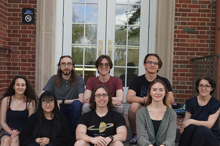 Hanna Terletska, far right, front row, associate physics professor at Middle Tennessee State University, poses on campus for a photo with some of the students from her new Quantum Computing course whom she recently helped mentor and get accepted for National Science Foundation Research Experience for Undergraduates placements this summer. Sitting back row, from left, are MTSU students Oscar Allen, Ethan Weiche and Ian Alcox. Sitting front row, from left, are MTSU students Kendra Givens, Monika Fouad, Thomas Freeman, Rachael Quinby and Terletska. (MTSU photo by Robin Lee)