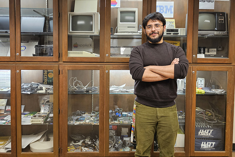 Carlos Aldana Lira, a computer science major at Middle Tennessee State University, is one of nine MTSU undergraduates who was accepted to a prestigious National Science Foundation Research Experience for Undergraduates placement this summer. Lira, pictured here in front of a computer display on campus in Murfreesboro, Tenn., will work on a computer science education research project at the University of Washington. (MTSU archive photo by Robin E. Lee)