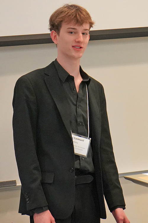 Middle Tennessee State University Honors freshman Sam Haley, an aerospace major, presents his research, “Sound’s Role in Crystallography: Manipulating Bismuth Crystallization,” during the 2025 Tennessee Collegiate Honors Council two-day annual conference hosted Feb. 28-March 1 on the MTSU campus in Murfreesboro, Tenn. (MTSU photo by Robin E. Lee)