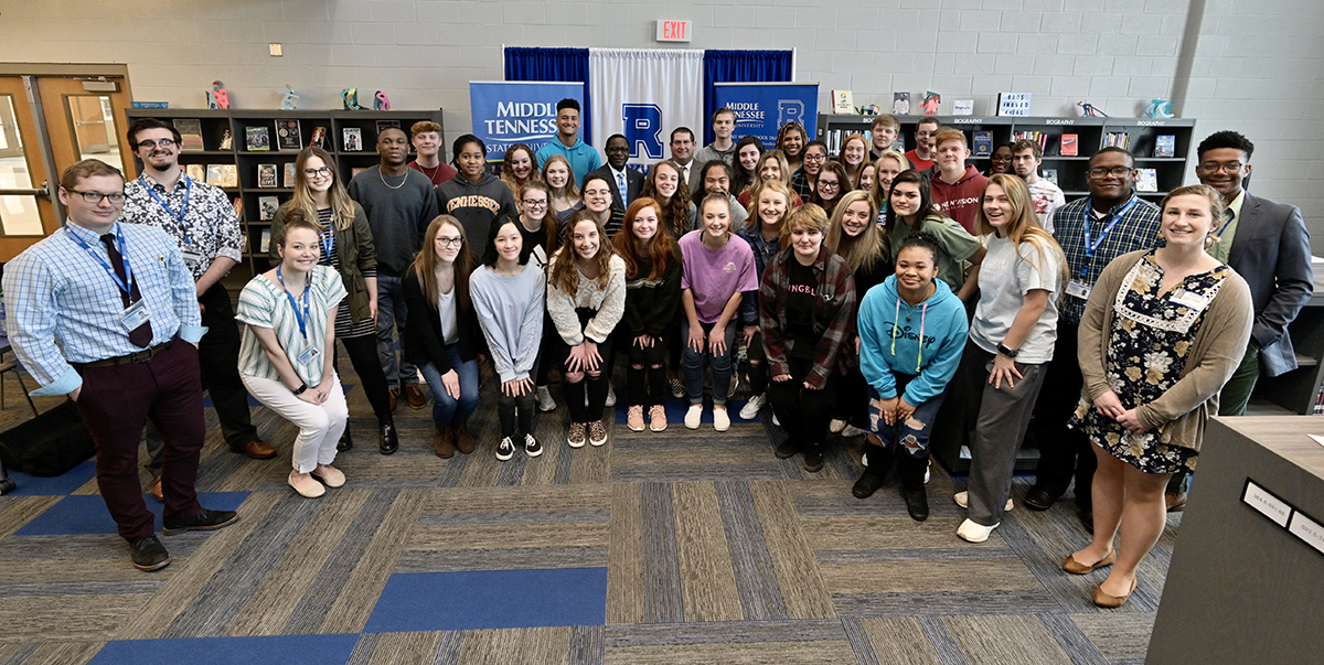 Nearly 40 Rockvale High School-MTSU dual enrollment students are shown with MTSU President Sidney A. McPhee and their principal, Steve Luker, following the MOU partnership signing in the school library Thursday, March 5, at the first-year high school in Rockvale, Tenn. (MTSU photo by Andy Heidt)