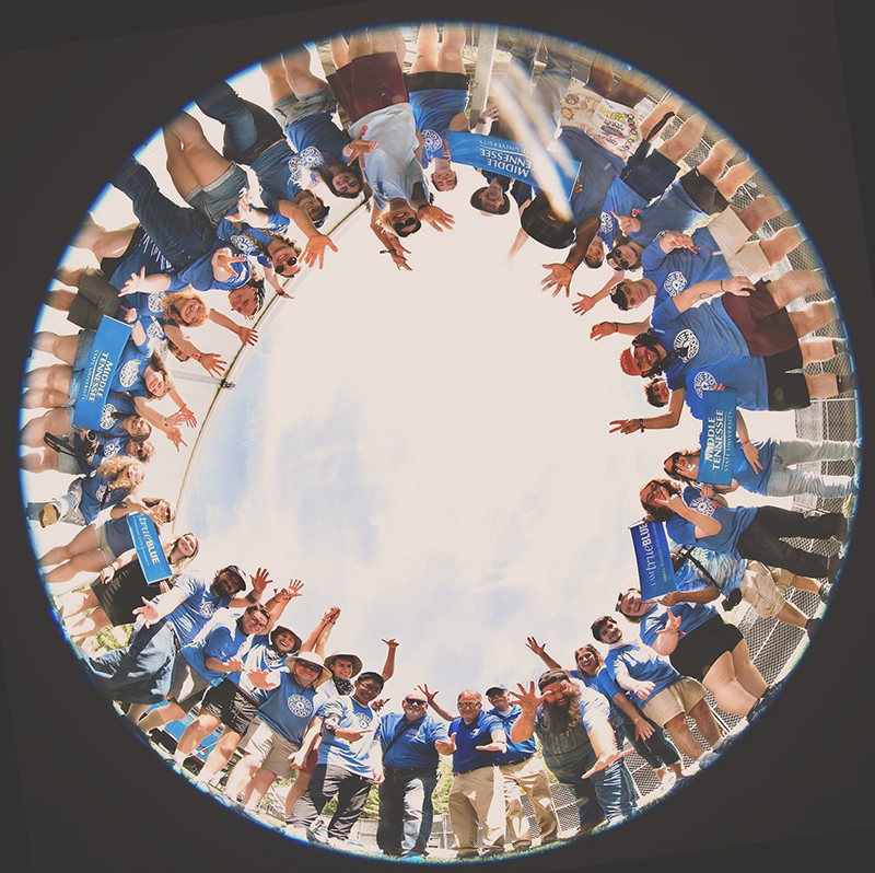 Some of the student, faculty and staff members of Middle Tennessee State University’s team at the 2024 Bonnaroo Arts and Music Festival pose for this special group photo at the Farm in Manchester, Tenn. (MTSU photo by Jonathan Trundle)