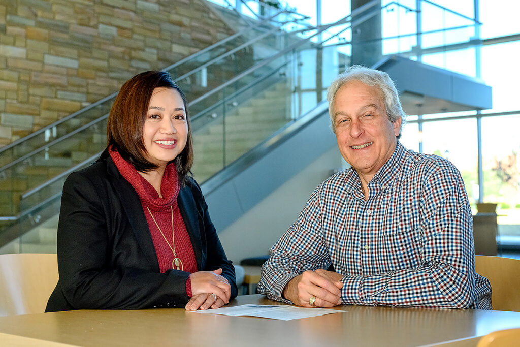 Cathy Rubin, left, and professor and MTSU Fermentation Science Director Tony Johnson sit in the Science Building’s Liz and Creighton Rhea Atrium. Rubin, who will graduate Dec. 11 during commencement in Murphy Center, completed her internship with the Tennessee Department of Agriculture’s Consumer & Industry Services division, drawing rave reviews from colleagues and administrators for her volunteer performance for three months. (MTSU photo by J. Intintoli)