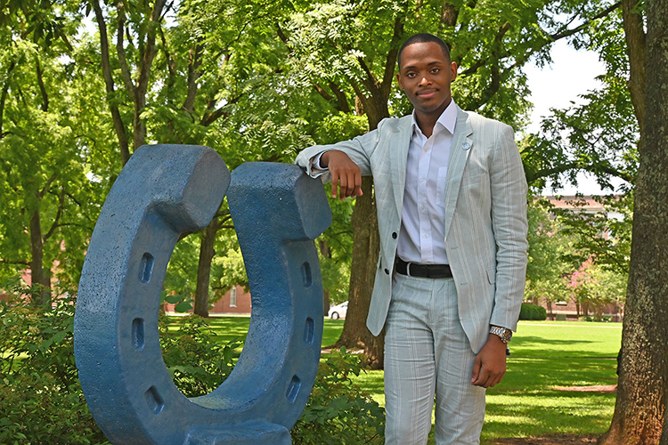 New MTSU Student Government Association President Winton Cooper poses next to the blue horseshoe in Walnut Grove July 14, 2021, on the Middle Tennessee State University campus in Murfreesboro, Tenn. (MTSU photo by Jimmy Hart)