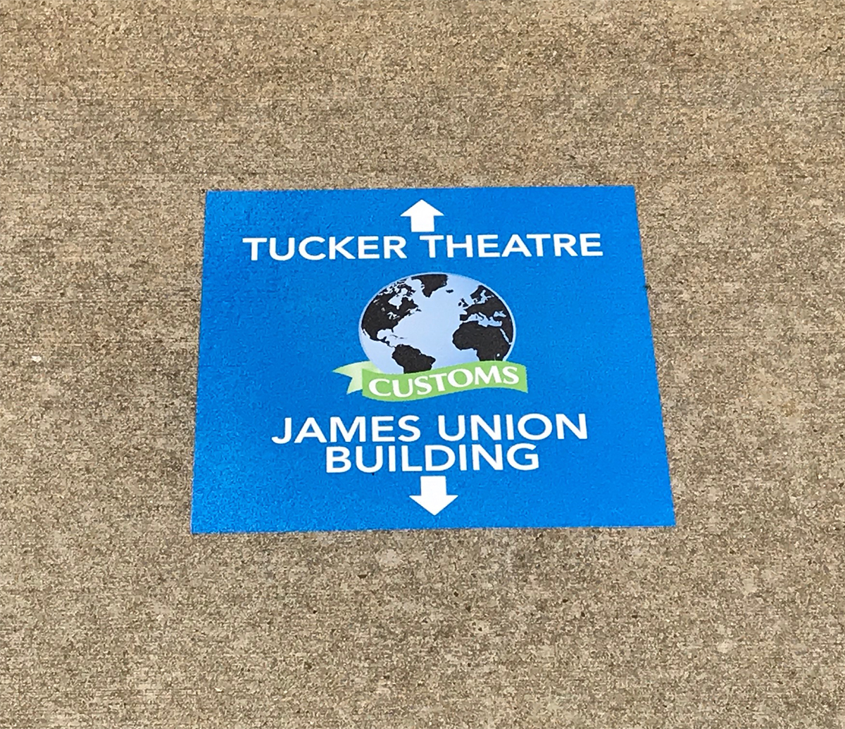New sidewalk stickers will greet new incoming freshmen and transfer students attending CUSTOMS orientation this spring and summer, and help them find building locations. The first two days of freshman orientation will be Thursday and Friday, May 16-17, and continue for two months. (MTSU photo by News and Media Relations)