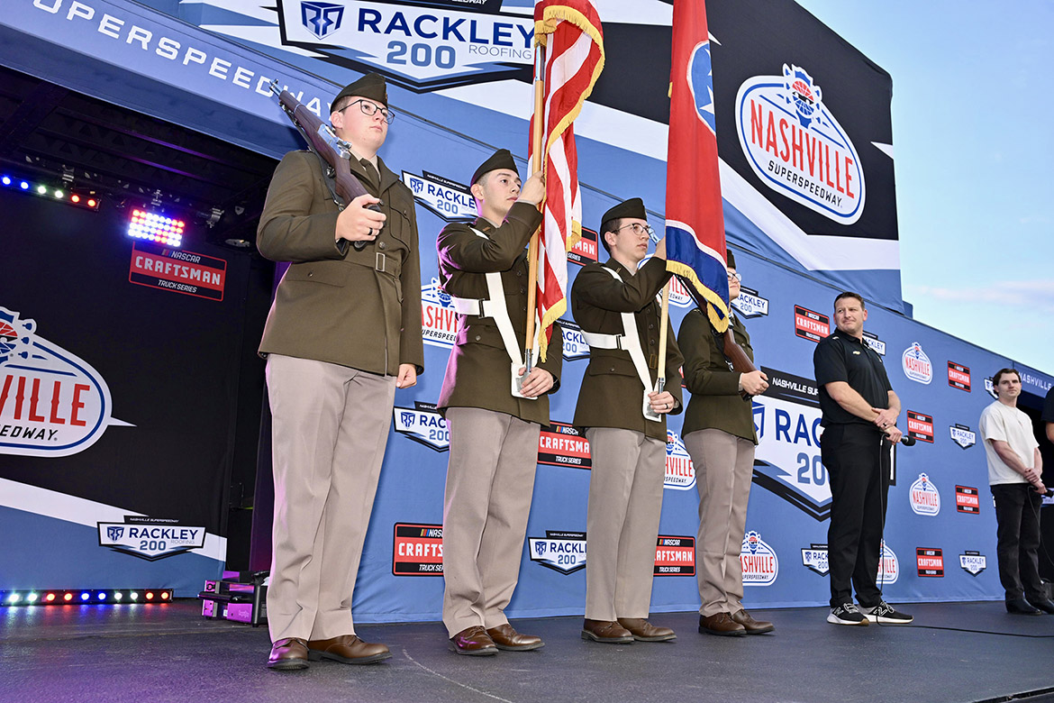 Members of the U.S. Army ROTC color guard from Middle Tennessee State University in Murfreesboro, Tenn., present the colors May 30 before the Rackley Roofing 200 at Nashville Superspeedway in Lebanon, Tenn. (MTSU photo by James Cessna)