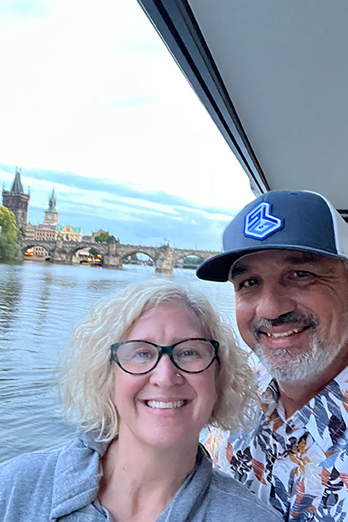 Middle Tennessee State University student Stan Laws, who is completing his bachelor’s degree in integrated studies through University College’s Adult Degree Completion Program, and his wife, Jen Laws, an MTSU alumna, pose for a photo while visiting Prague, capital of the Czech Republic, during a family vacation. (Submitted photo)
