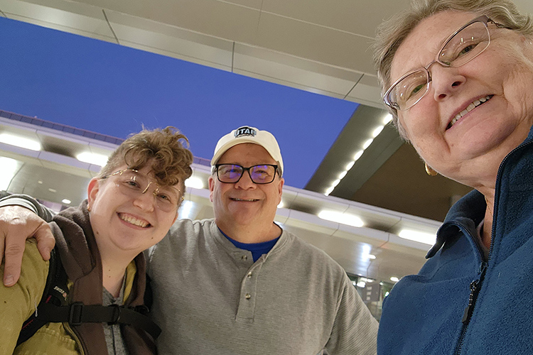 In this undated photo, Middle Tennessee State University spring 2025 graduate Sue Stephens, right, and husband Tim, center, takes a selfie with daughter Sarah while dropping her off at the Nashville International Airport to fly home to Utah. Sue Stephens, soon to be 63, will receive her degree in integrated studies during the Saturday, May 10, morning ceremony at Murphy Center in Murfreesboro, Tenn. (Submitted photo)
