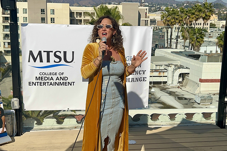 Middle Tennessee State University alumna Summer Rona sings “Wildfire” during a special event in Los Angeles honoring MTSU alumni nominees held Saturday, Feb. 1, in advance of the 67th Grammy Awards. The singer, composer and producer wrote the song for the Saturday event to draw awareness to the fundraising efforts by the charitable organization MusiCares for artists impacted by the Southern California wildfires. (MTSU photo by Andrew Oppmann)