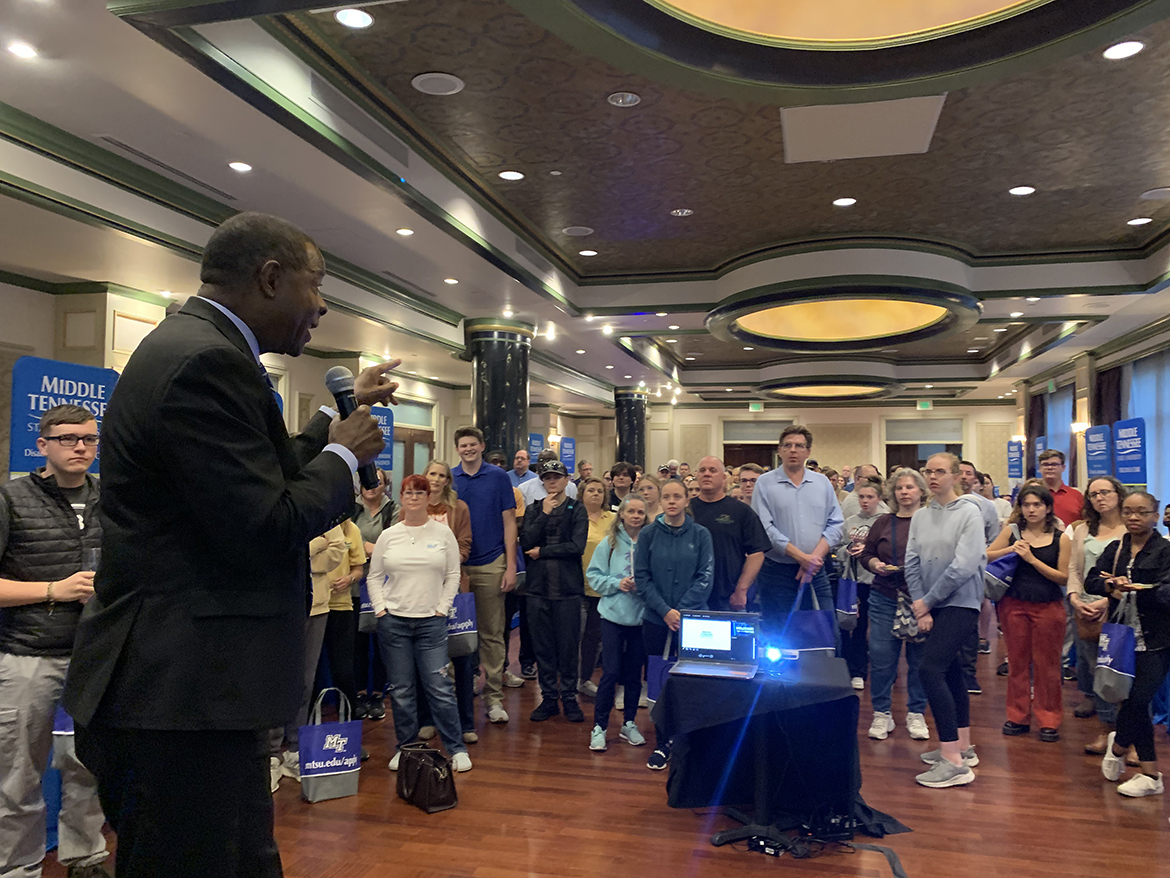 Middle Tennessee State University President Sidney A. McPhee addresses the audience of prospective high school and transfer students attending the annual True Blue Tour recruiting event Oct. 24 at the Carnegie Hotel in Johnson City, Tenn. Through a drawing, he awarded five scholarships during the two-hour event. (MTSU photo by Randy Weiler)