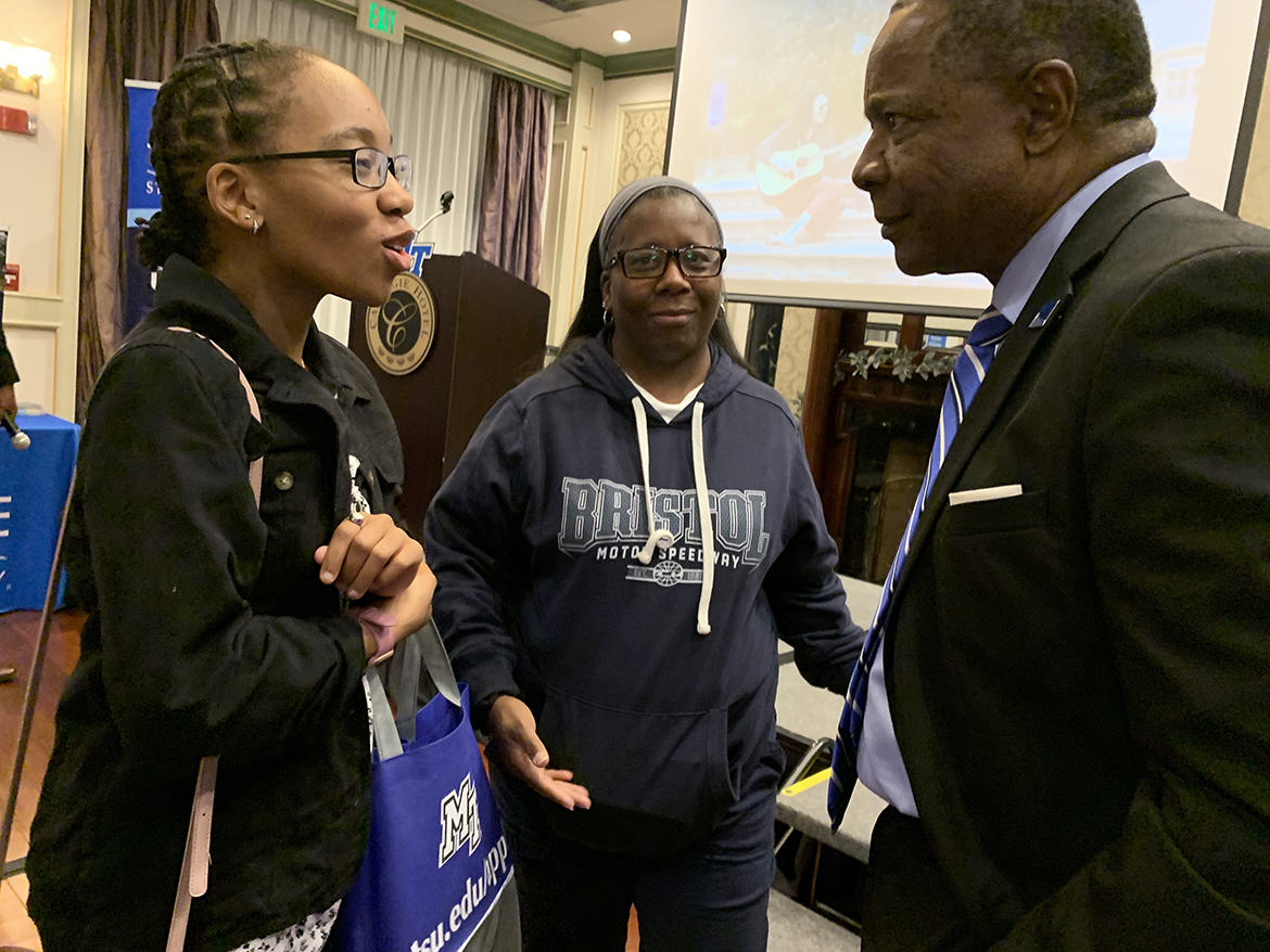 Johnson City, Tenn., Science Hill High School junior Parker Tebbe, left, and her mother, Erin Tebbe, discuss the prospective student’s interest with Middle Tennessee State University President Sidney A. McPhee Oct. 24 during the university’s True Blue Tour visit to Northeast Tennessee. The event was held at the Carnegie Hotel and drew dozens of potential students wanting to learn more about MTSU’s 300-plus academic programs. (MTSU photo by Randy Weiler)
