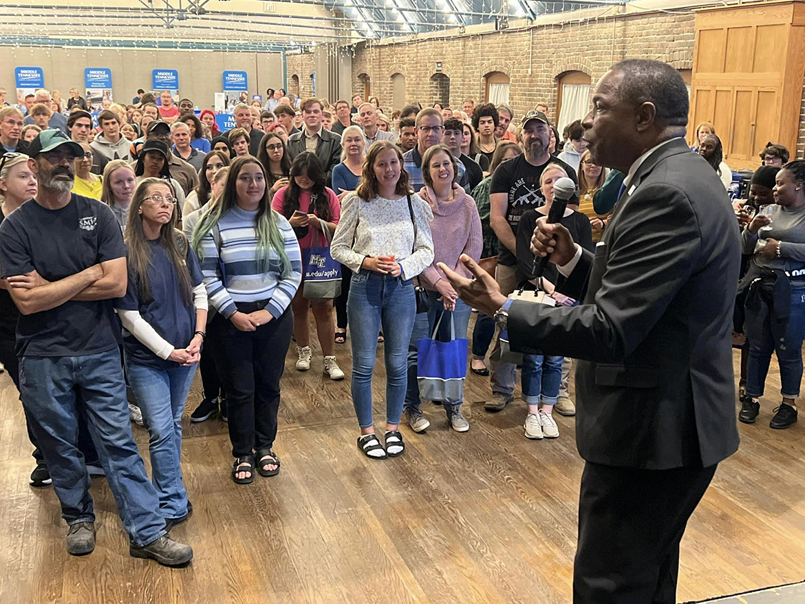 Middle Tennessee State University President Sidney A. McPhee addresses the audience of prospective high school and transfer students attending the annual True Blue Tour recruiting event Oct. 25 at The Foundry On the Fair Site in Knoxville, Tenn. Through a drawing, he awarded multiple scholarships as students learned about housing, the Honors College and met with representatives from the various MTSU colleges. (MTSU photo by Andrew Oppmann)