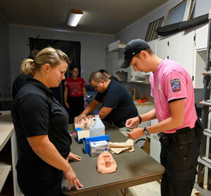 Lt. Andrew Bennett, right, and Sgt. Patrick Fajardo, left, of the Middle Tennessee State University Police Department, take turns practicing tactical emergency casualty care under Defend Systems instructor supervision as part of a training held on campus on Sept. 17, 2020. (MTSU photo by Stephanie Barrette)