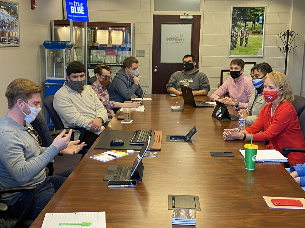 Former Tennessee House Speaker Beth Harwell, right, and others listen as Ben Adams, left, comments on plans for MTSU’s delegation to attend the annual Tennessee Intercollegiate State Legislature in November in Nashville, Tenn. Harwell, MTSU’s Distinguished Visiting Scholar, mentored the MTSU students before they left for the event. (MTSU photo by Andrew Oppmann)