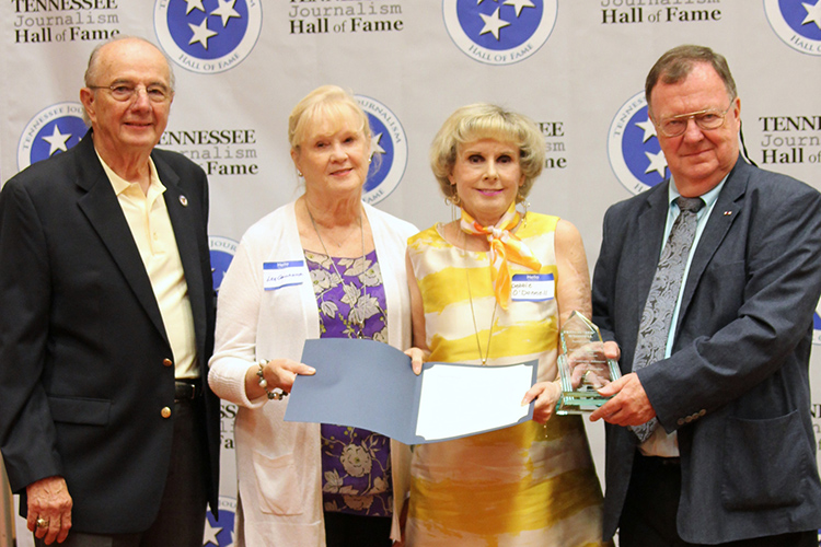 Debbie O’Donnell, second from right, niece of the late Francis “Red” O’Donnell, accepted the posthumous award and certificate on behalf of the Nashville Banner columnist during the induction ceremony for the 2019 class of the Tennessee Journalism Hall of Fame held Tuesday, Aug. 6, at Embassy Suites in Murfreesboro, Tenn. Shown with her are sister Lee O’Donnell Gallagher, Hooper Penuel, far left, and TJHOF co-founder and secretary, and TJHOF President Larry Burriss, right. (Submitted photo)