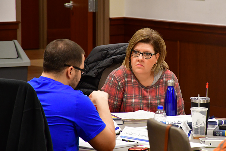 MTSU adult learner Tara Jones of Murfreesboro, facing camera, listens to a classmate earlier this month as she began her spring semester classes in Applied Leadership, one of the flexible programs geared toward adult learners that offers online courses combined with intensive on-campus classes. The program’s flexibility allowed Jones to the classroom for the first time in almost three decades. (MTSU photo by Hunter Patterson)