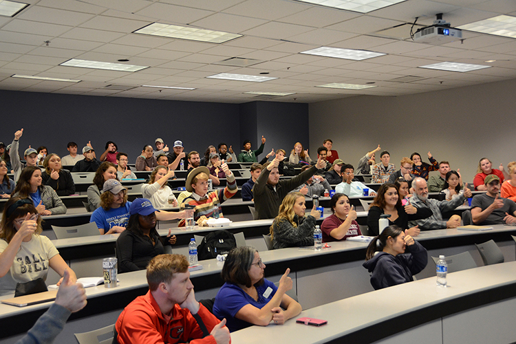 MTSU management students respond to a question from social entrepreneur and author Matt Tenney, who was giving a guest lecture about the value of servant leadership Thursday, Oct. 17, inside the Business and Aerospace Building classroom. (MTSU photo by Jimmy Hart)