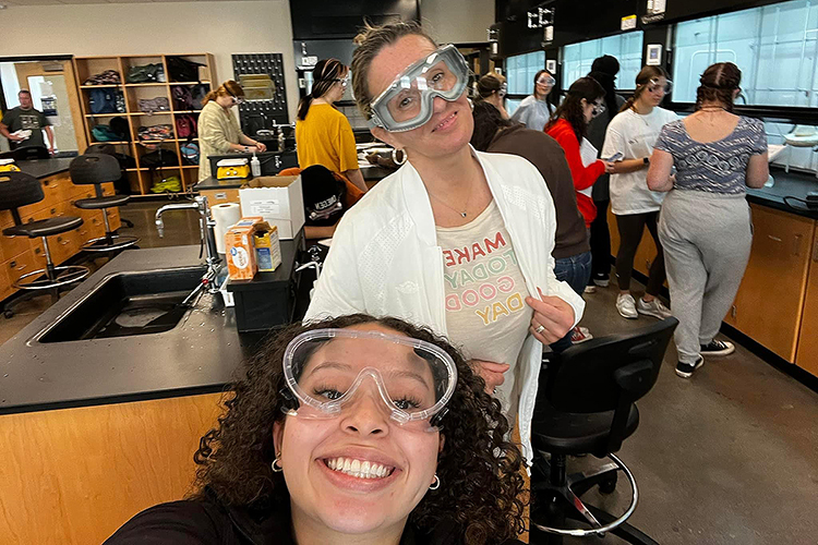 Middle Tennessee State University nontraditional student Toscha McClain, top, is shown here in a chemistry class with a fellow classmate in this undated photo on the MTSU campus in Murfreesboro, Tenn. McClain returned to school in her 50s and is set to earn her bachelor’s degree in professional studies in the fall. (Submitted photo)