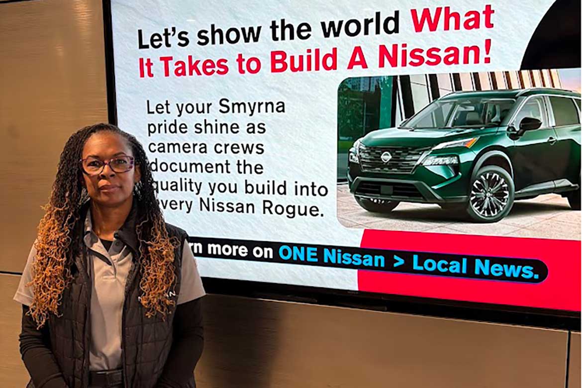 Tracey Bowden is pictured here in front of a display sign at the Nissan North America plant in Smyrna, Tenn., where she works in human resources. Bowden is currently working on a degree in Middle Tennessee State University’s Adult Degree Completion program where she is able to use skills she has learned on the job through Prior Learning Assessment. (Submitted photo)