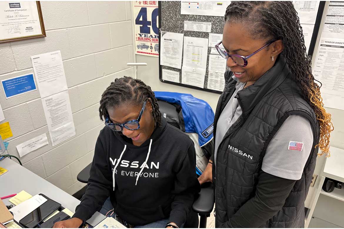 Tracey Bowden, right, chats with a co-worker at the Nissan North America plant located in Smyrna, Tenn., where she works in human resources for the automaker. Bowden is currently enrolled in Middle Tennessee State University’s Adult Degree Completion Program. (Submitted photo)