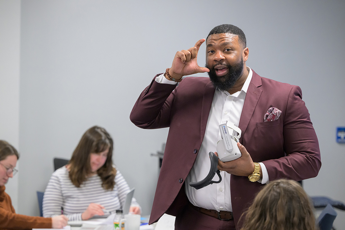 EJ Presley with Transfr, a virtual reality company, makes a point regarding how to use the VR technology while addressing librarians from six rural Midstate counties recently in a Middle Tennessee State University Fairview Building classroom in Murfreesboro, Tenn. More than a dozen library representatives attended training to help their patrons utilize VR to enhance their careers and job prospects. A nearly $550,000 federal grant from the Institute of Museum and Library Services obtained by the MTSU School of Agriculture is a three-year plan to stimulate workforce development in the rural areas. (MTSU photo by Andy Heidt)