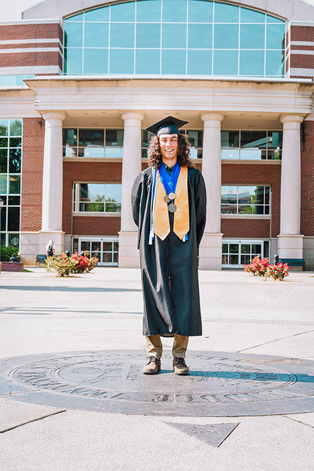 Jared Frazier, Middle Tennessee State University computer science major and undergraduate researcher, celebrates his May 7, 2022, graduation on campus and will start a graduate computational science program in the Netherlands this fall. (Photo courtesy of Jared Frazier)