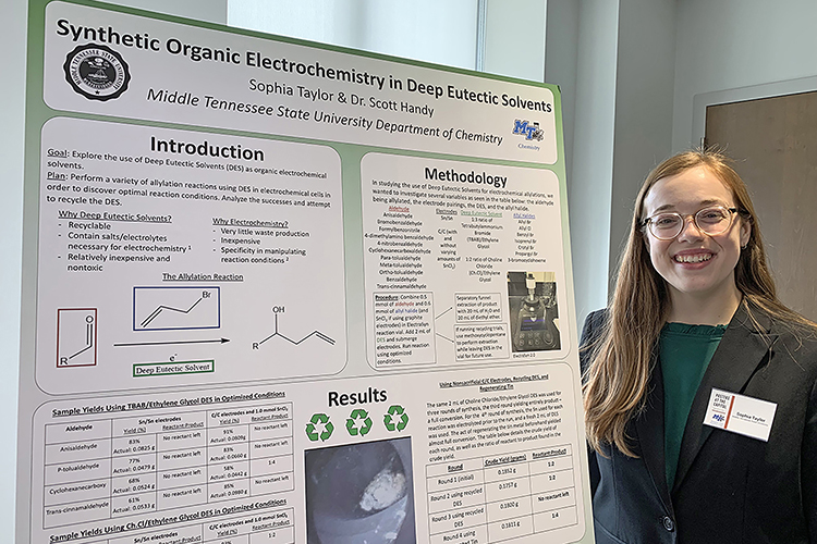 Sophie Taylor, Middle Tennessee State University chemistry major and undergraduate researcher, presents her research during the annual Posters at the Capitol event Feb. 16, 2022, at the Tennessee State Capitol in Nashville, Tenn. (MTSU photo by Randy Weiler)