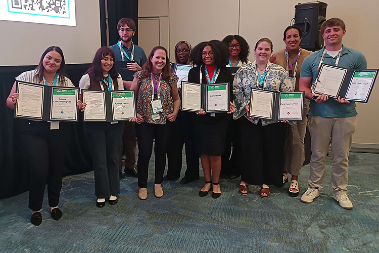 Members of an advertising and public relations student team from Middle Tennessee State University in Murfreesboro, Tenn., hold their runner-up certificates at the 2025 USPS Direct Effect Innovation Challenge on April 28 in Nashville, Tenn. Pictured, from left, are Raiane Costa Rodrigues, Kaleigh Young, Jackson Willis, a Chick-fil-A representative, Sekinat Ekunsumi, Kristin Blake, Asia Sanders, Clara Hasenwinkel, a Chick-fil-A representative, and Jack Wrye. Not pictured is Jordan Henley. The team of MTSU students created a full advertising campaign for fast-food restaurant Chick-fil-A on deadline as part of an invitation-only event featuring 18 universities. (Submitted photo)
