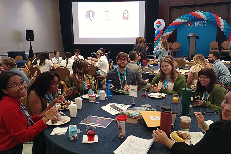 Members of an advertising and public relations student team from Middle Tennessee State University in Murfreesboro, Tenn., enjoy breakfast refreshments at the 2025 USPS Direct Effect Innovation Challenge at the National Postal Forum hosted in Nashville, Tenn. on April 27-28. Pictured, from left, are Kristin Blake, Asia Sanders, Sekinat Ekunsumi, Jackson Willis, Clara Hasenwinkel, Kaleigh Young and Raiane Costa Rodrigues. The team received runner-up for creating a postal marketing campaign for fast-food restaurant Chick-fil-A. (Submitted photo)