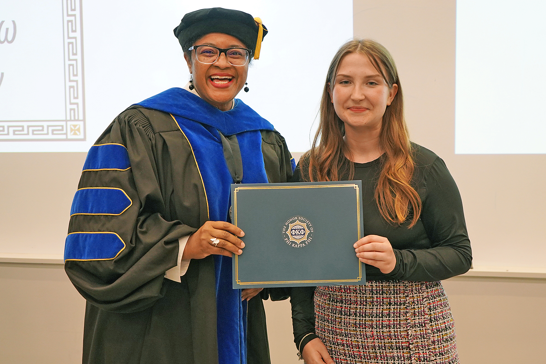 Victoria Grigsby, a 2025 graduate of Middle Tennessee State University in Murfreesboro, Tenn., is presented the Pi Kappa Phi Honor Society Pioneer Award by College of Liberal Arts Dean Leah Tolbert Lyons. (Submitted photo)