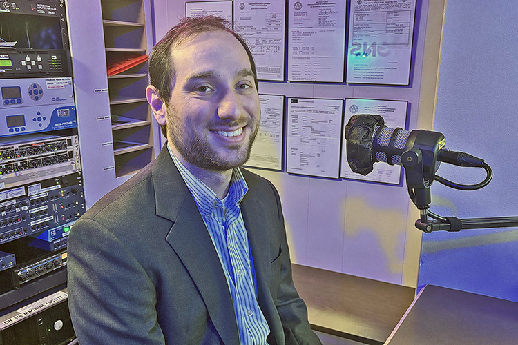John Villanova, assistant professor in the Department of Physics and Astronomy and associate director of research in the QRISE Center at Middle Tennessee State University, discussed the new center as a guest on the WGNS Radio “Action Line” program on Dec. 15 from the station’s studio in downtown Murfreesboro, Tenn. (MTSU photo by Nancy DeGennaro)