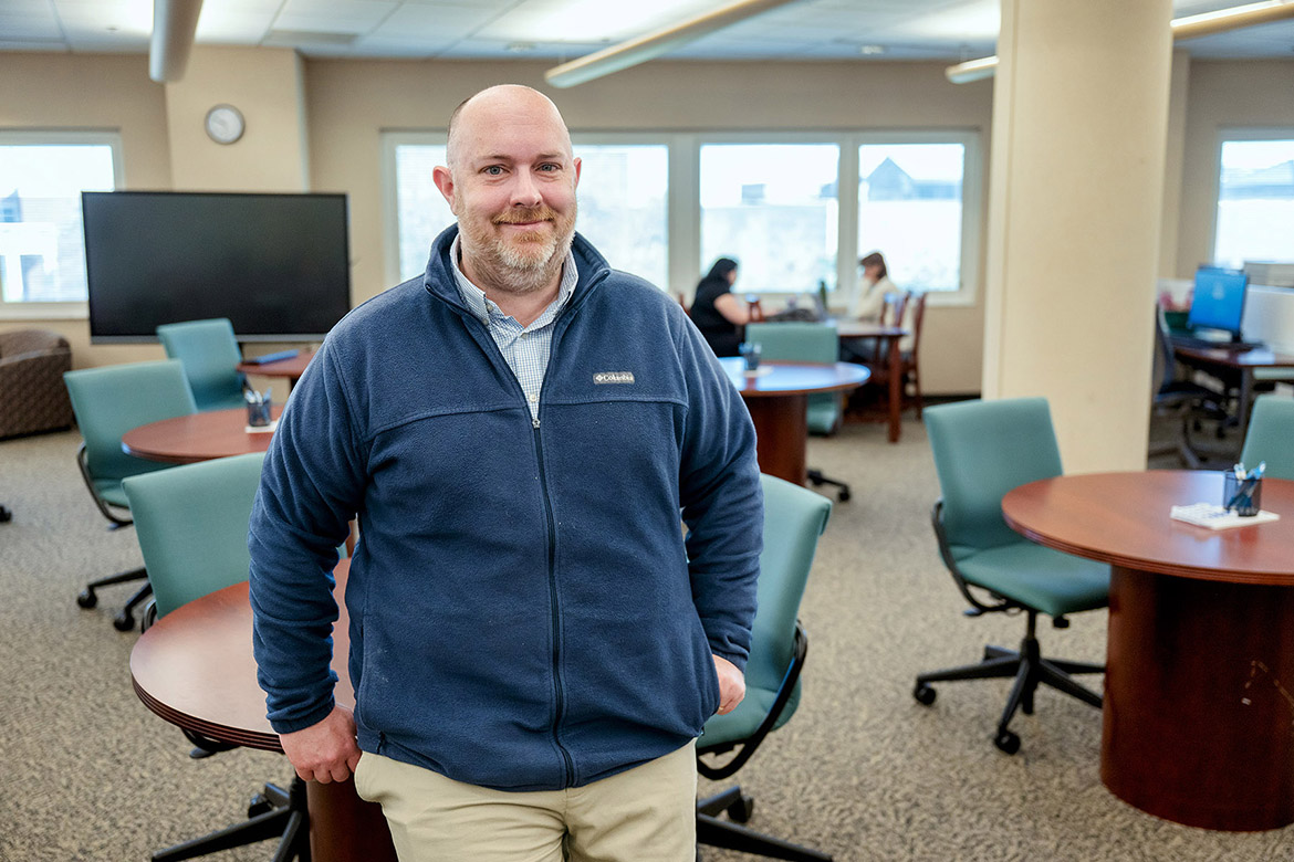 James Hamby, associate director of the Margaret H. Ordoubadian University Writing Center at Middle Tennessee State University in Murfreesboro, Tenn., stands in the main tutoring room at the center, located in Room 362 at James E. Walker Library on campus. The center provides writing assistance and support services for students, faculty and staff. (MTSU photo by J. Intintoli)