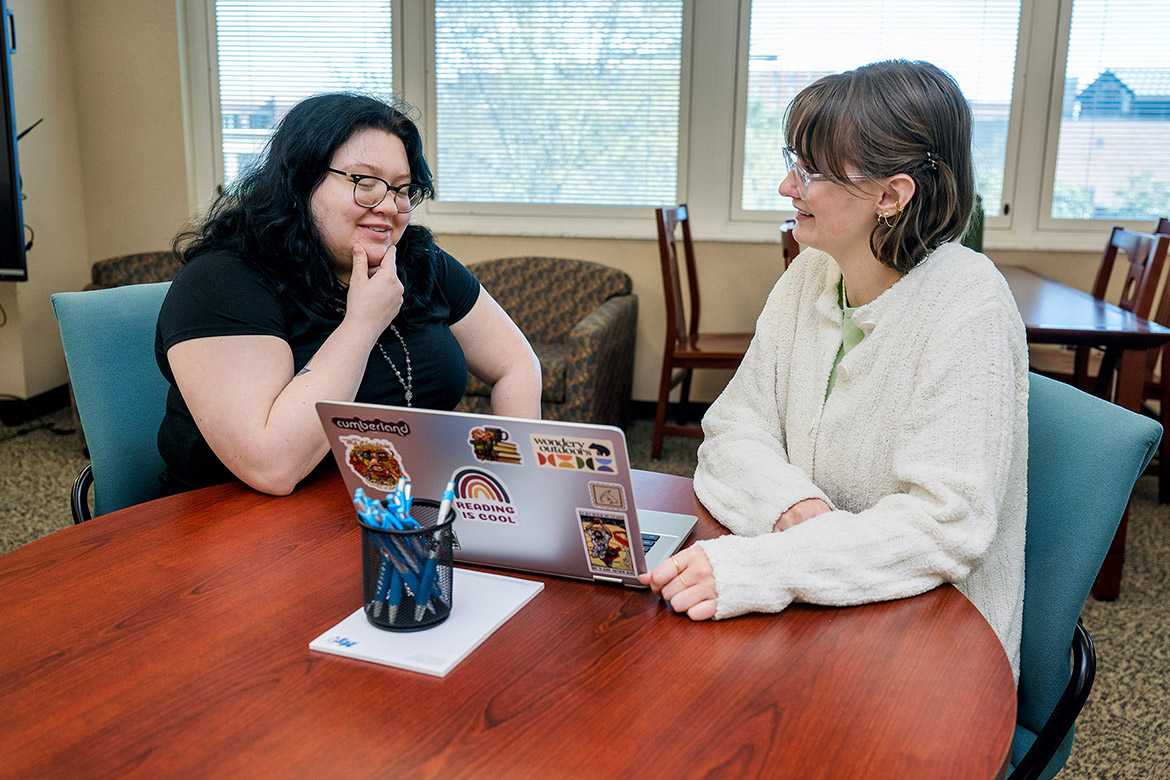 Graduate student Danielle Ordus, left, and English major Molly Smith work on a project together in the Margaret H. Ordoubadian University Writing Center at Middle Tennessee State University in Murfreesboro, Tenn. Located in Room 362 at James E. Walker Library on campus, the center provides free writing assistance and support services for students, faculty and staff either virtually, via email or in person. (MTSU photo by J. Intintoli)