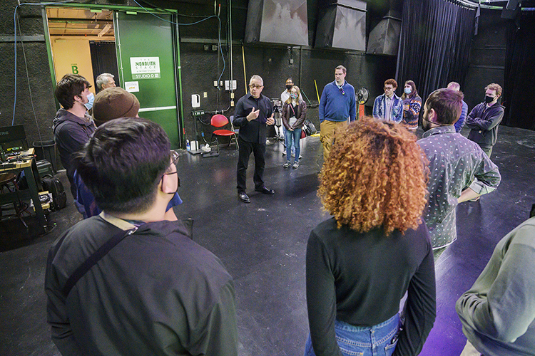 MTSU media students listen carefully to David Bennett, vice president of business development at Monolith Studios, before they begin production for a "teaser" commercial in Nashville for the Department of Media Arts' new extended reality, or XR, stage, a new type of film and video production stage with high-resolution video screens that will enable them to create projects anywhere, anytime. Monolith Studios has advised MTSU on its new setup for its XR facility, the only one of its kind at a Tennessee university, which will be ready for classes this fall. (MTSU photo by Andy Heidt)