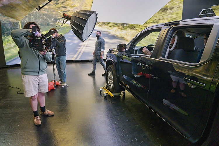 MTSU media students focus on the vehicle interior while producing a "teaser" commercial in Nashville for the Department of Media Arts' new extended reality, or XR, stage, a new type of film and video production stage that will enable them to create projects anywhere, anytime. The MTSU XR facility, the only one of its kind at a Tennessee university, will be ready for classes this fall. (MTSU photo by Andy Heidt)