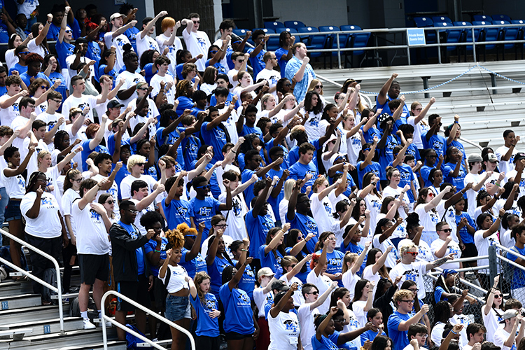 About 300 students from the Office of Student Success’s Scholars Academy and STAR early arrival programs practice the “Let’s Go Blue” chant from the student section inside Floyd Stadium Wednesday, Aug. 17. (MTSU photo by J. Intintoli)