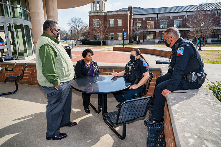 Middle Tennessee State University police officers and team members, from left, Leroy Carter, Vergena Forbes, Derrick Wharton and Joy Williams pose outside of the Student Union building on campus on Feb. 10, 2021. (MTSU photo by Andy Heidt)