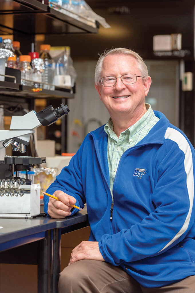 Warren Gill, School of Agribusiness and Agriscience faculty, in one of the Science Building labs for the EXL Magazine.