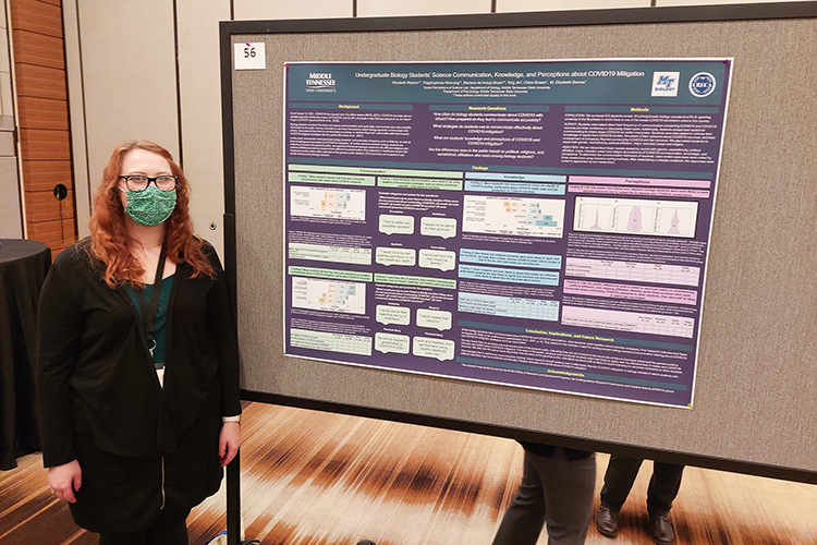 Elizabeth Wybren, Middle Tennessee State University undergraduate researcher, presents innovative research about effective science communication that she contributed to the National Association of Biology Teachers conference in November 2021 in Atlanta, Ga., for which she won an undergraduate research poster competition award. (Photo courtesy of Liz Barnes)