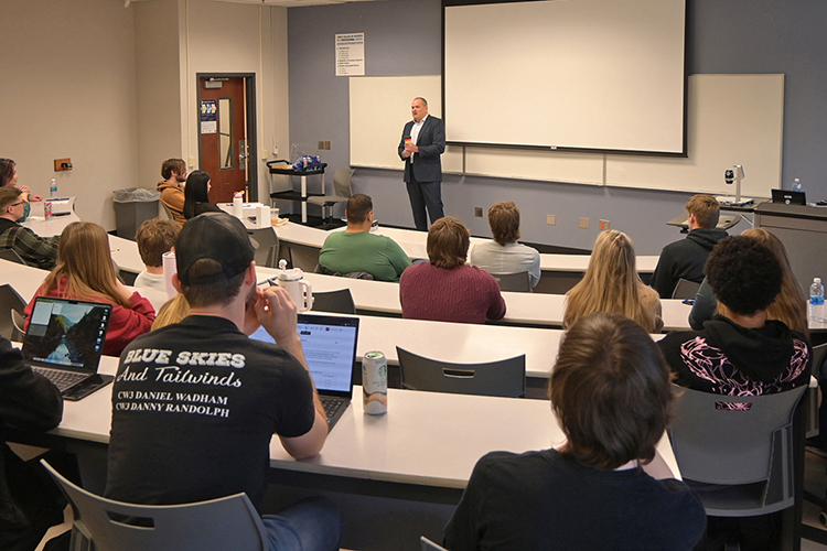 Retired FBI supervisory special agent Scott Augenbaum speaks to members of Middle Tennessee State University’s Association of Information Systems student chapter during the monthly meeting on Tuesday, Feb 25, inside the Business and Aerospace Building on campus in Murfreesboro, Tenn. Augenbaum, whose talk was also livestreamed to 70 other student chapters, offered advice to students and answered questions at the end of the meeting. (MTSU photo by Jordan Reining)