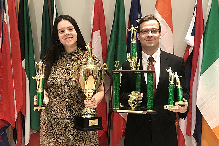 Anastasia Ortiz, left, a double major in biochemistry and political science from Gatlinburg, Tenn., and Graham Christophel, a sophomore international relations major from Morristown, Tenn., show off their awards March 1 at Arkansas Tech University’s debate tournament. Ortiz was named second best speaker in the nation, and Ortiz and Christophel together were named second best team in the nation for the 2019-2020 season. (Photo submitted)