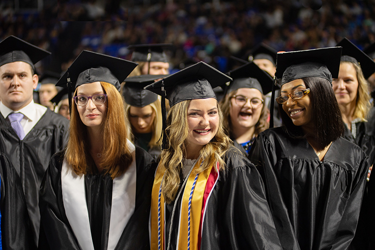 Happy members of MTSU's Class of 2019 await the university's morning commencement ceremony inside Murphy Center on Saturday, Dec. 14. (MTSU photo by James Cessna)