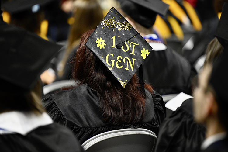 A graduating senior at MTSU's fall 2021 commencement ceremonies proudly displays her accomplishment on her mortarboard as a first-generation college graduate Saturday, Dec. 11, inside Murphy Center. The university presented degrees to more than 1,670 students in three commencement events to conclude the fall semester. (MTSU photo by J. Intintoli)