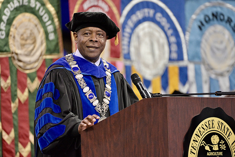 MTSU President Sidney A. McPhee tells the crowd that the institution is "Tennessee's University of Opportunities" while presiding over its Dec. 10 commencement ceremonies in Hale/Earle Arena inside Murphy Center. MTSU presented 1,698 students with their degrees — 1,345 undergraduates and 353 graduate students — to mark the first graduation of its 112th academic year. (MTSU photo by Andy Heidt)